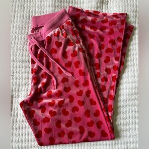 Sugar Thrillz pants.  Size medium.  Pink with red hearts.  Like new.